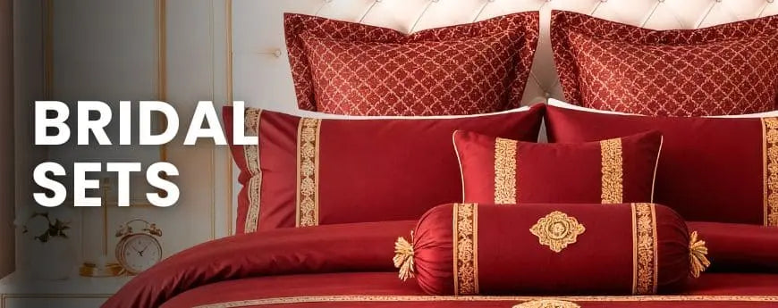 Red bridal set with gold accents on a white background